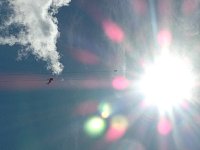 Zipline rider seen from below