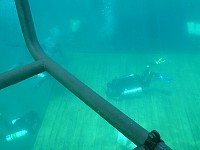 Diving lesson on underwater platform