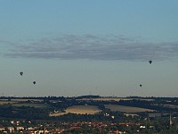 Earlier balloons in the distance