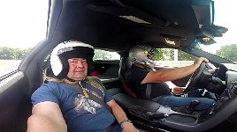 Me as passenger in Corvette on race track