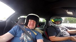 Me as passenger in Corvette on race track