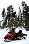 Snowmobile outside lapp tent