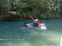 Kayaker vs. swimmer