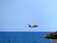 Canadair CL-415 touch-and-go landing on water