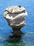 Climbing boulder near Melagavi lighthouse