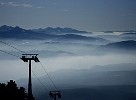Haze over the valleys, blue skies above