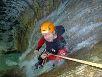 Abseil slide on canyoning tour
