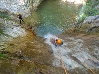 Abseil slide on canyoning tour