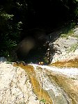 Abseil slide on canyoning tour