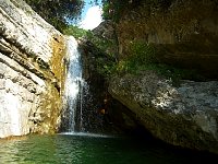 Abseil close to a waterfall near Tremosine