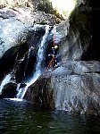 Abseil down small waterfall