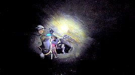 Ziplining across gap between tunnels