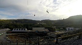 People coming down zipline C