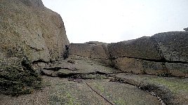 Guide at smaller crack in the rocks
