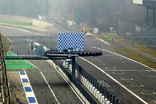 Podium overhanging race track