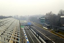 Podium overhanging race track