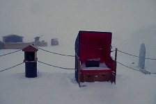 Igloo village deserted beach chair