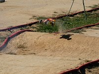 Model car on dirt track