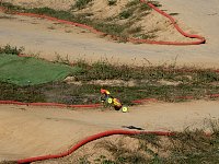 Model car on dirt track