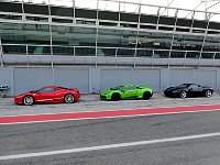 Sports cars parked at Monza pit lane
