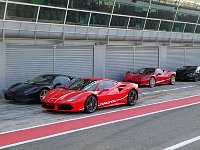 Sports cars parked at Monza pit lane