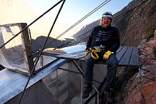 Sitting on the edge of Skylodge sleeping pod sun roof