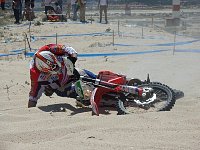 Biker picking up bike