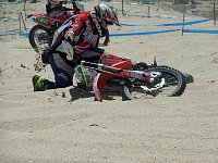 Biker picking up bike