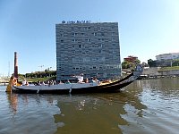 Boat on small lake in front of hotel