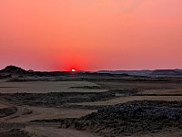 Partial solar eclipse during sunset