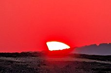 Partial solar eclipse during sunset