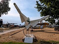 Rocket monument with inscription at Madrid plane museum