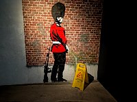 Guard stencil art at Banksy museum in Madrid