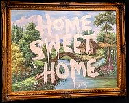 Home sweet home oil painting at Banksy museum in Madrid