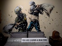 Walled-Off Hotel art at Banksy museum in Madrid