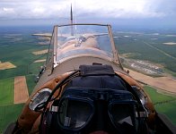 Tiger Moth above highway service station