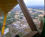 Tiger Moth above highway