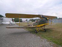 Tiger Moth near hangar