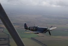 Spitfire close to Dragon Rapide