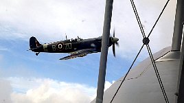 Spitfire close to Dragon Rapide