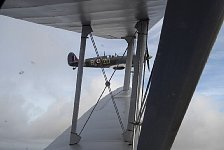 Spitfire close to Dragon Rapide