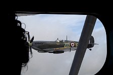 Spitfire close to Dragon Rapide