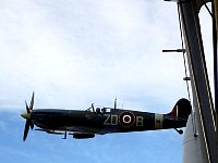 Spitfire close to Dragon Rapide