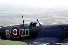 Spitfire with open cockpit close to Dragon Rapide