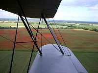 Red field as seen from Stampe biplane