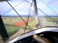 Red field as seen from Stampe biplane