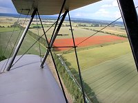 Red field as seen from Stampe biplane