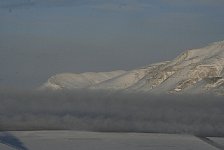 Dark cloud over open water