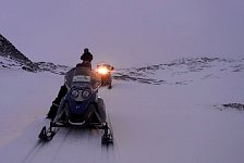 Early evening snowmobile ride