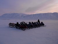 Snowmobiles parked at Tempelfjorden